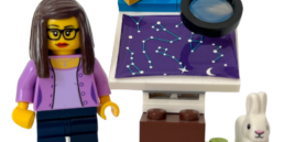 Rikke as a Lego Mini Fig with a star map and a white rabbit